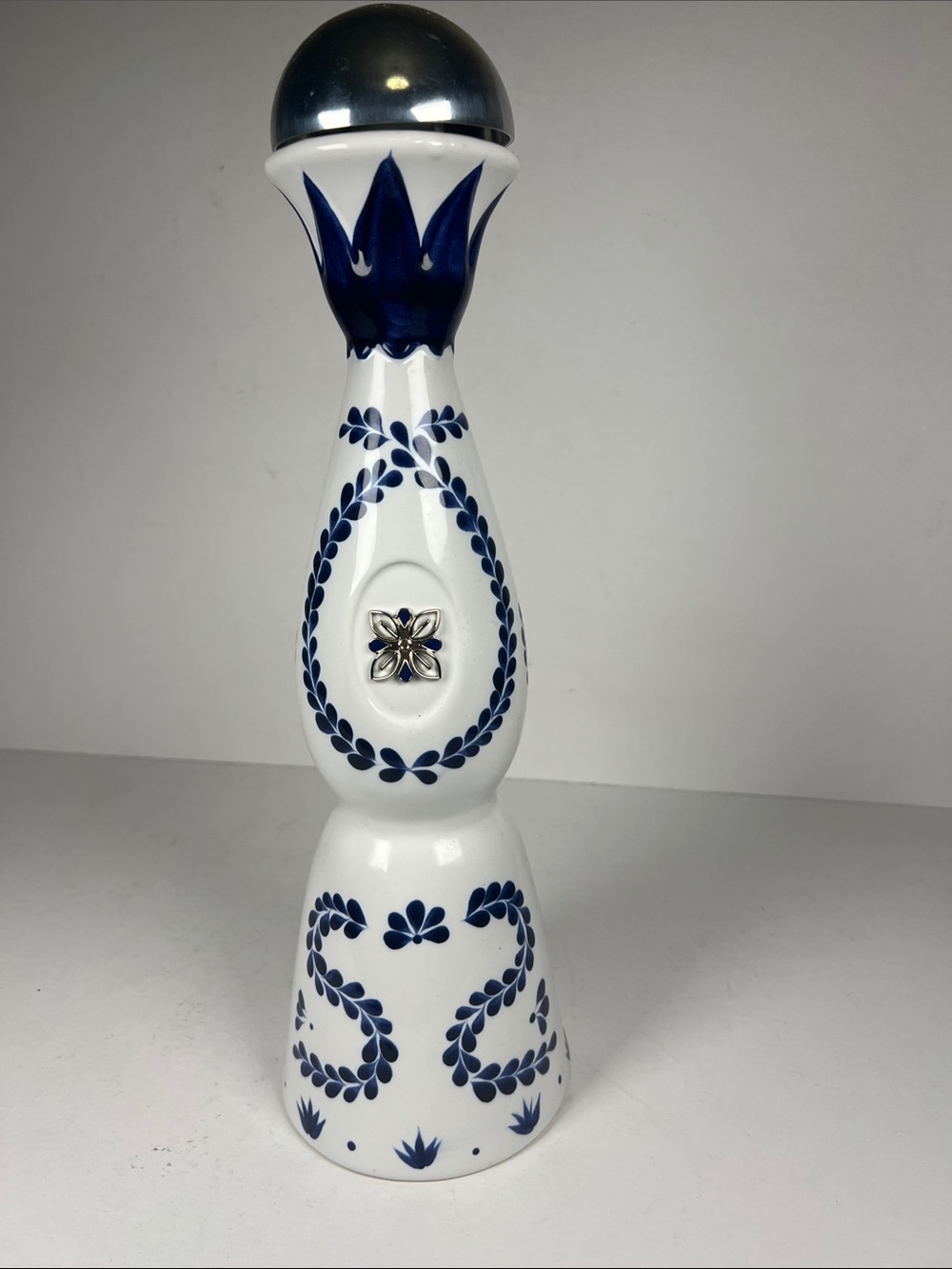 Ceramic Decorative Bottle with Navy Blue Floral Accents
